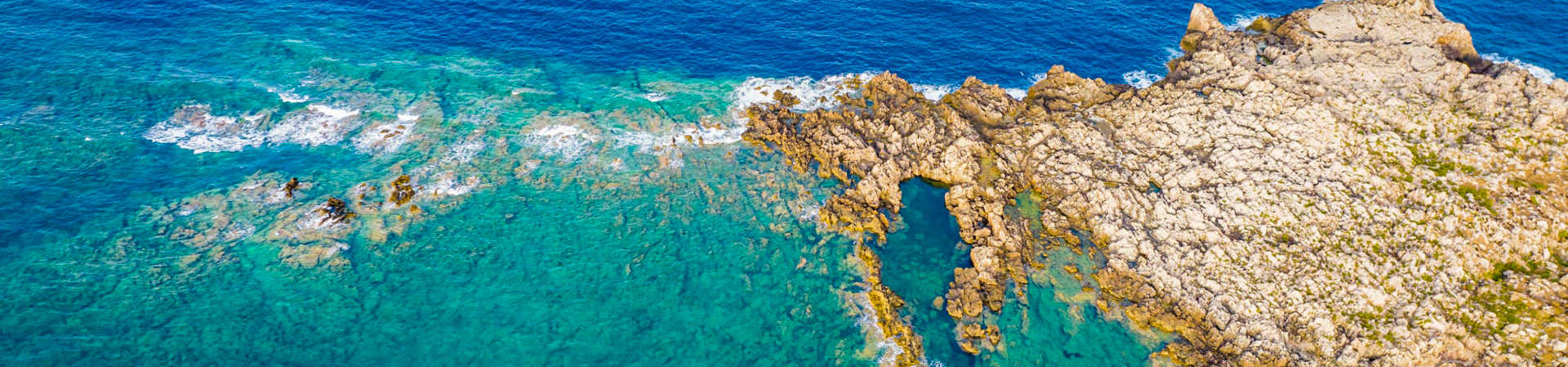 Turquoise sea along the coast of Menorca